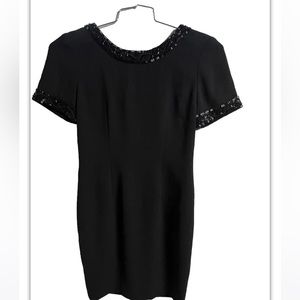 Patrick petite 4 black beaded trim short sleeves criss cross back sheath dress.